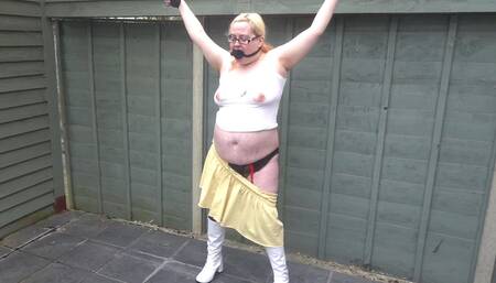 Tied up in miniskirt, stockings and boots