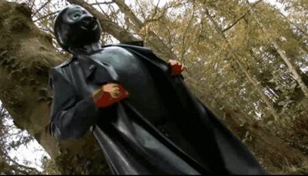 Latex queen and her inflatable black rubber suit - Walking in the park