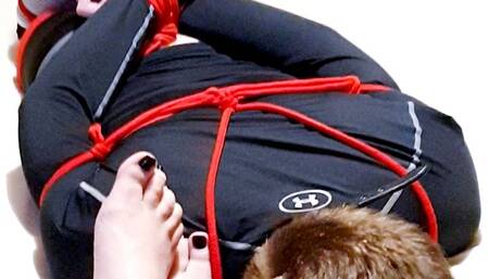 Man hogtied at my feet in tight leggings 1 -BBW Domination,BBW bondage,man tied up,bound and gagged man,leggings,compression gear,amateur,gay bondage,man in bondage,male bondage,socks,rope bondage,hogtied,hogtie,struggling,
