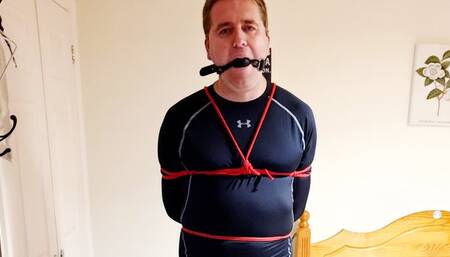 Tied up man made to hop- BBW Domination,BBW bondage,man tied up,bound and gagged man,leggings,compression gear,amateur,gay bondage,man in bondage,male bondage,socks,rope bondage,hop,hopping,