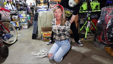 Housewife Amanda Kent finds herself tied up and gagged in the basement during a home invasion!