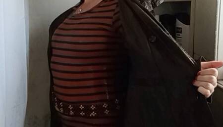 Soaking wet in a jacket and dress