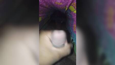 Close up masturbation under the blanket