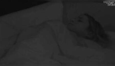 Voyeur girl fingering on bed