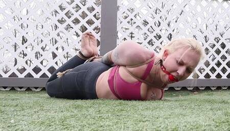 Vivica tightly bound and gagged in a brutal bondage hogtied on the patio SDmp4