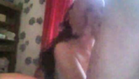 Her parents are in another room, but she doesn't care