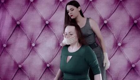 Hand over mouth, scissors on dress