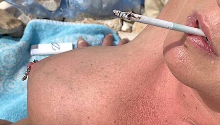 Smoking Cigarettes on the Beach at day and in Sunset