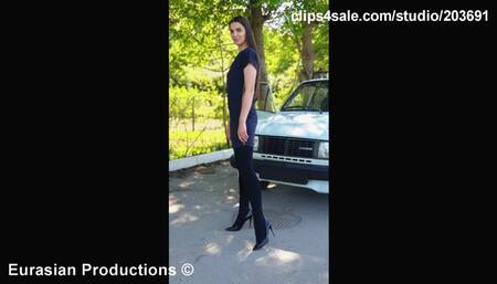 85B - Jessy Skoda drivinging in stockings & heels back seat view