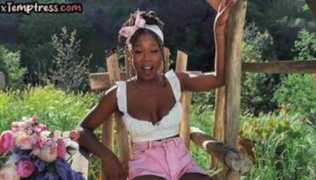 Busty Ebony babe in high heel boots fingering pussy outdoor