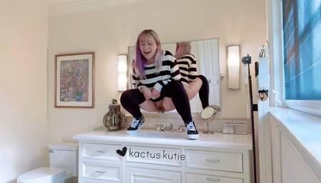 peeing in the family sink