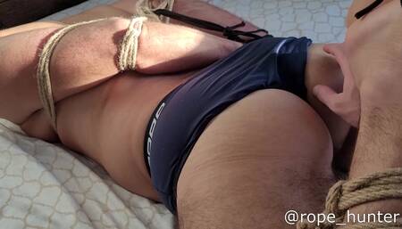 Hogtied on bed and being teased