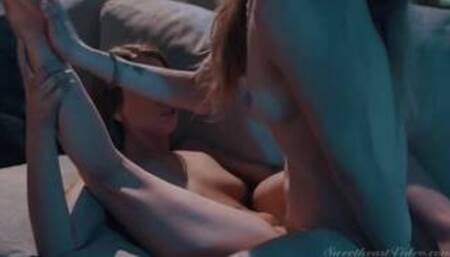 Karla K and Jillian J on a sofa in a lesbian scene together