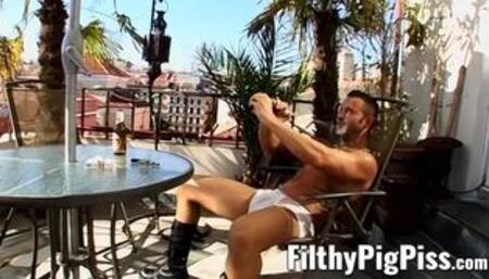 Freaky homo showers his cock and ass with beer outdoors