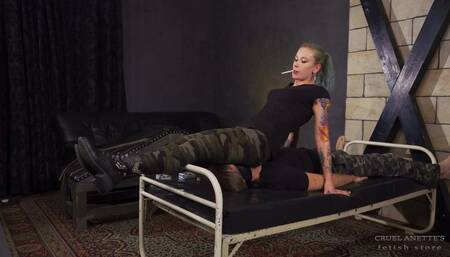 Sitting on his face in camo pants