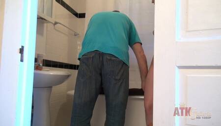 Bryn Blayne poses in the bathroom