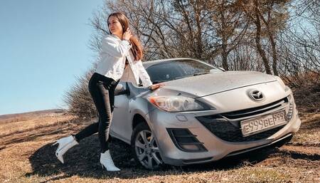 CARSTUCK Stuck in the wet ground in white high heels