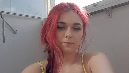 Smoking in a pool wearing a bikini