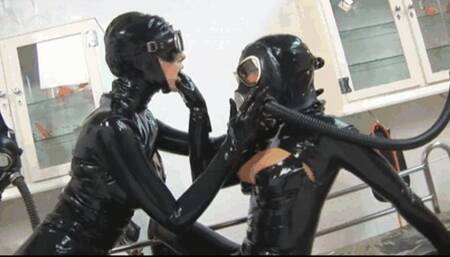 The black rubber gas mask fetish slut with her latex girlfriend - Pussy licking and fingering - Pissing on belly