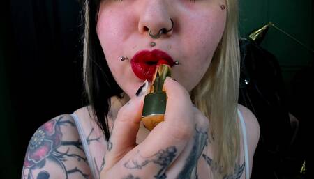 Putting a red lipstick and ruin it