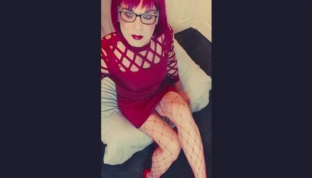 Legs and a classic red heeled shoe