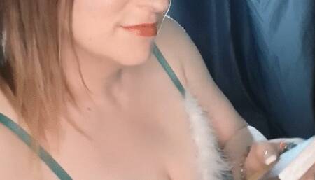 smoking an all white cigarette in green lingerie