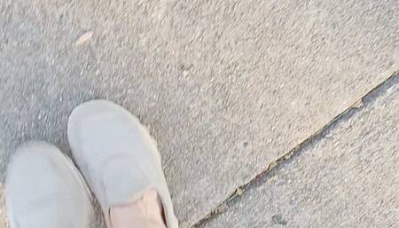 In butterfly dress walking to park