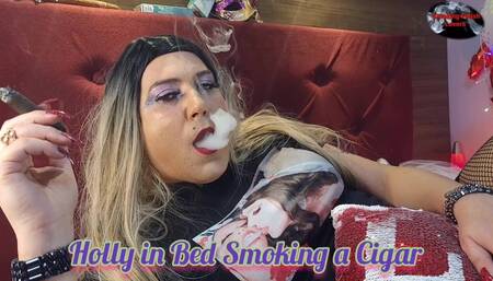 Holly in Bed Smoking a Cigar