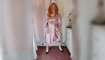Crossdresser in vintage satin dress
