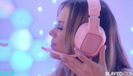 Aidra Fox and Avery Cristy on a white coloured bed in a lesbian scene together