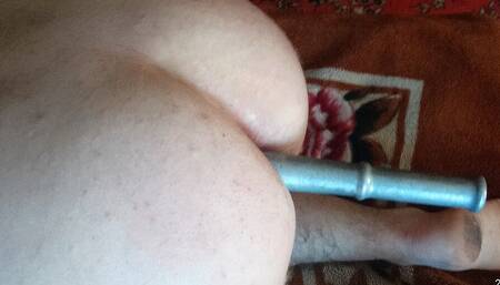 Passive slut slaps herself with a belt on the ass and fucks Anal with a 27 cm Phallus