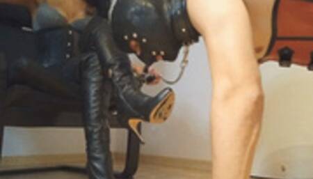 Leather boots spit shining