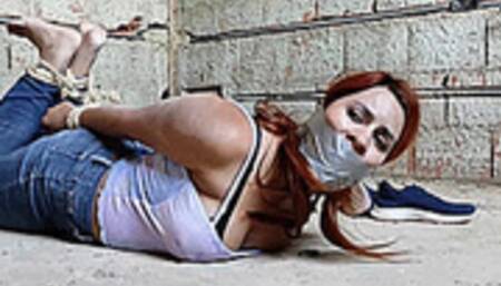 Hot Study Buddy Hogtied Barefoot And Left Tape Gagged And Helpless In An Old Prison! (wmv)