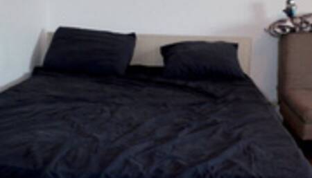 On the bed, a couple having a hard fucking