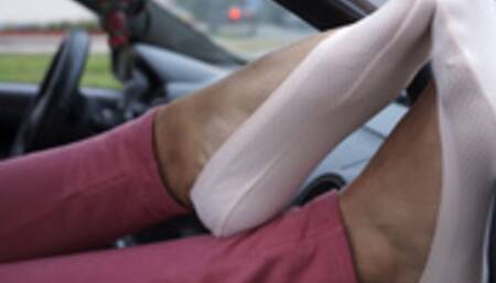 Xiomara's light pink ped socks in the car!