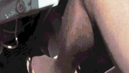 Inflating the pedals of an old ZIL car in black pantyhose with bare feet