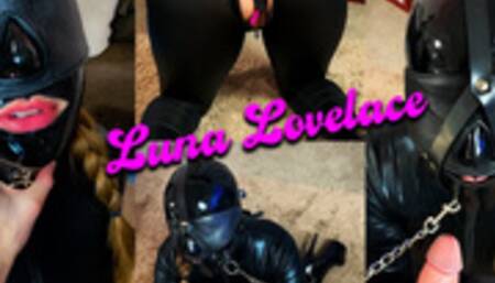 Rubberdoll Padlocked in cuffs and panel gag for handjob and cumshot