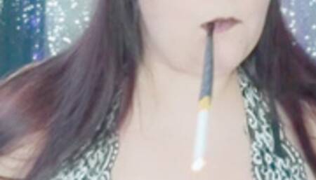 Nicki Pie smokes with cigarette holder plays with her tits