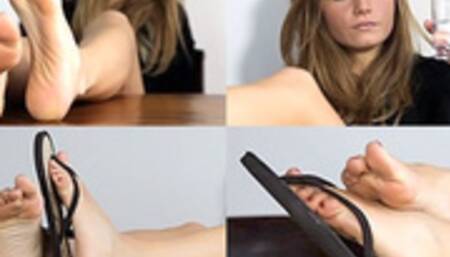 Bianca plays with flip-flops at the table, then goes barefoot