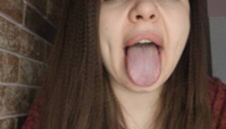 Demonstration of deep throat and sweet tongue