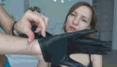 hands in leather gloves over her mouth and on her neck III