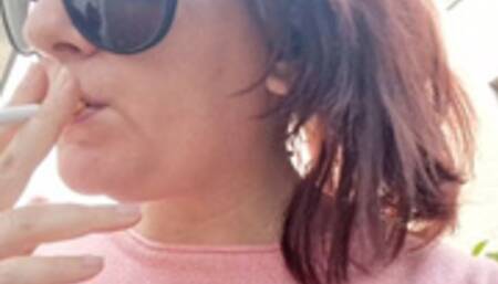 Sexy Italian in the public garden smokes and shows you her big breasts 760HD