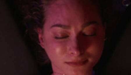 Lilith awakes upside down suspended on a cross