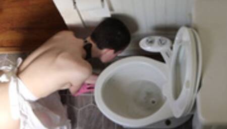 Cleaning the Toilet in Apron and Heels