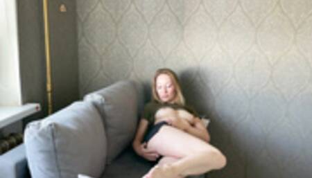 Smoking MILF masturbating on the couch at home