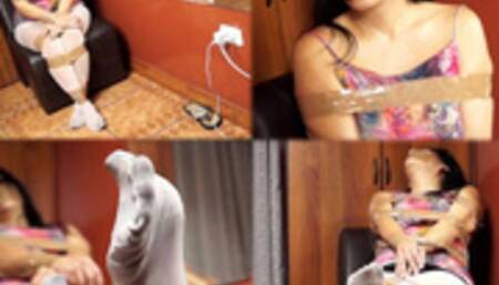 Taped, helpless and struggling in vain!