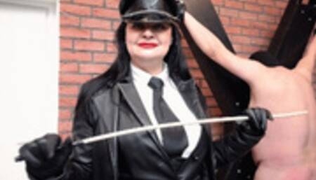 Hard Caning in Warsaw Prison by Leather Mistress Dinah