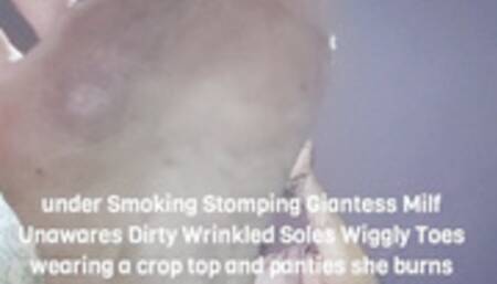 under Smoking Stomping Giantess Milf Unawares Dirty Wrinkled Soles Wiggly Toes wearing a crop top and panties she burns herself and Jumps up and down