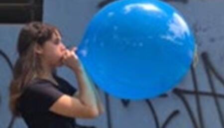 Katie Blows to Pop a Blue 16" Punchball