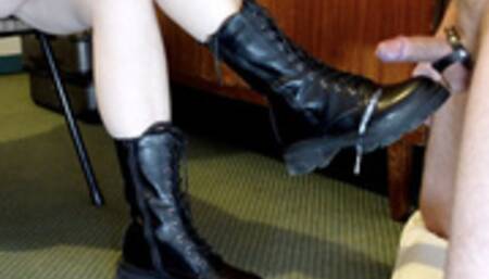 Teasing bootjob for the restrained cock